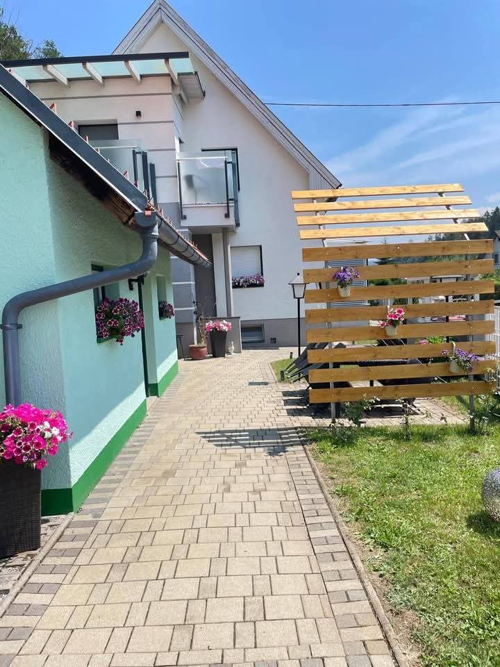 MonteurZimmer - Garten - Haus Sonnenschein