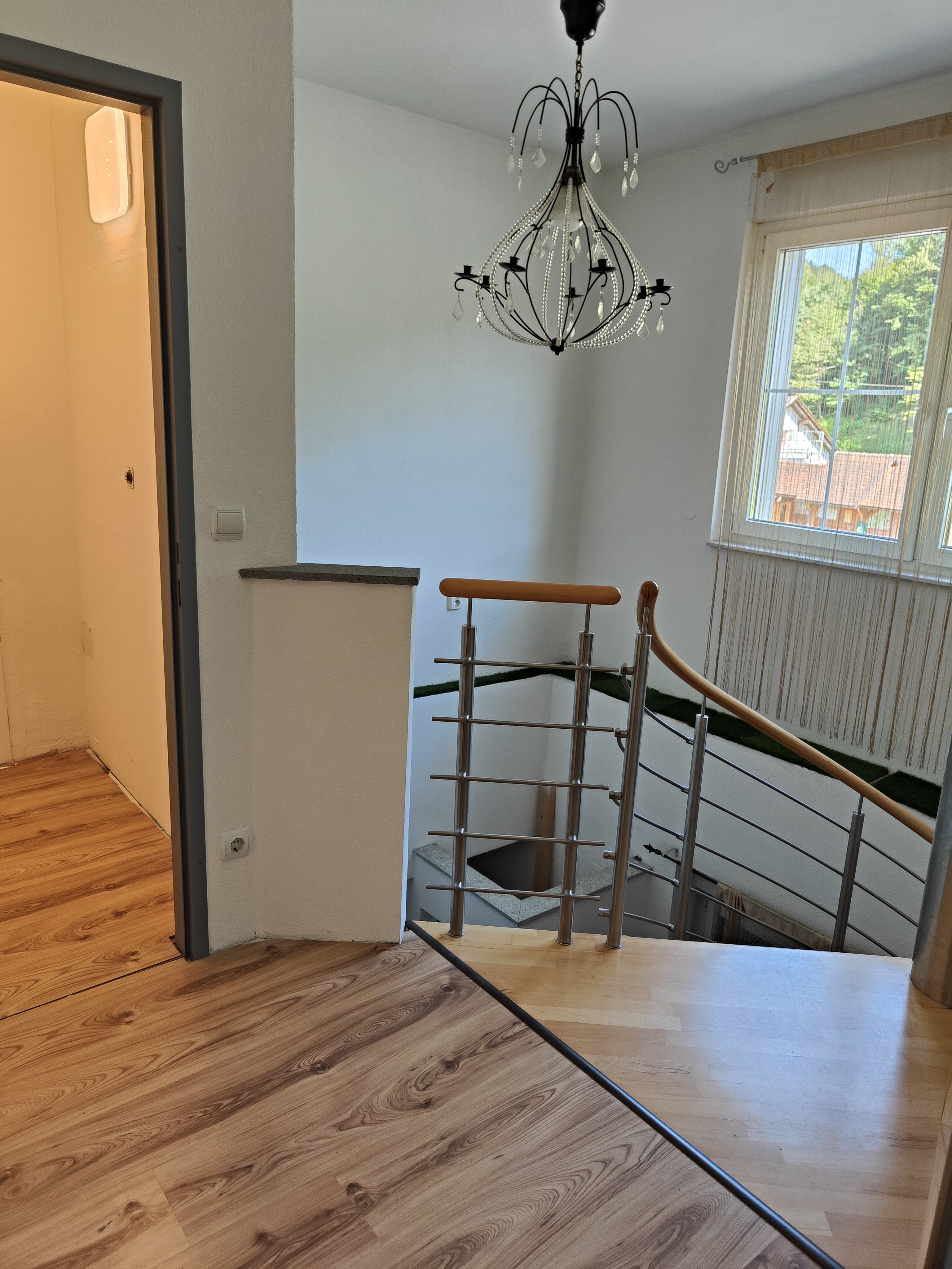 MonteurZimmer: Wendeltreppe erster Stock - Ferienwohnung Dorfleben