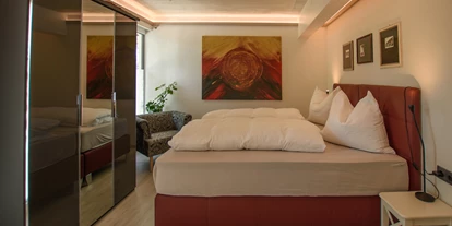 Monteur-Zimmer - Stockenboi - Schlafzimmer - auf Wunsch mit getrennten Betten - Garten Appartement Harmony