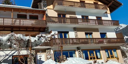 Monteur-Zimmer - Stockenboi - Unser Haus im Winter  - Ferienwohnung Lemberger