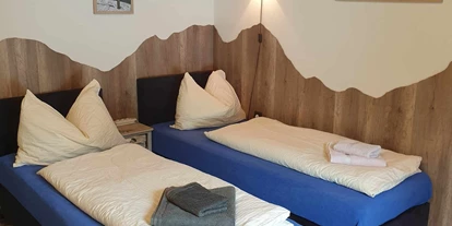 Monteur-Zimmer - Zwischenreinigung - Nockberge - Fewo 'Winterthaler' im EG mit 2 Einzelbetten - Ferienhaus Schäfer