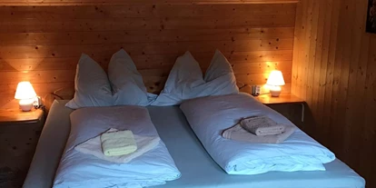 Monteur-Zimmer - Zwischenreinigung - Nockberge - 1. Schlafzimmer Fewo 'Eisenhut' mit Doppelbett - Ferienhaus Schäfer