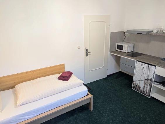 MonteurZimmer: Einbettzimmer mit Küche - Monteurzimmer & Apartments in TOP Ausstattung