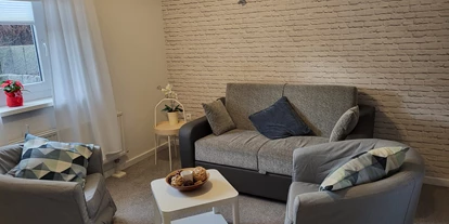 Monteur-Zimmer - Preis pro Nacht - Ferienwohnung Wohnraum - Gästehaus Harrislee