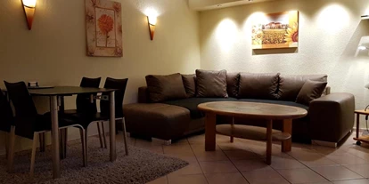 Monteur-Zimmer - Preis pro Nacht - Wohnzimmer - Ferienwohnung Engelsby