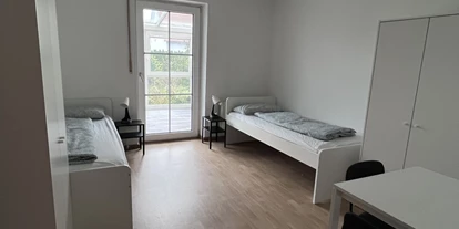 Monteur-Zimmer - Aystetten - nice2be Monteurswohnungen für bis zu 18 Personen in Augsburg in 86316 Friedberg