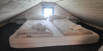 Monteur-Zimmer - Küche - Österreich - Doppelbett im Schlafloft - Smi's Tiny House