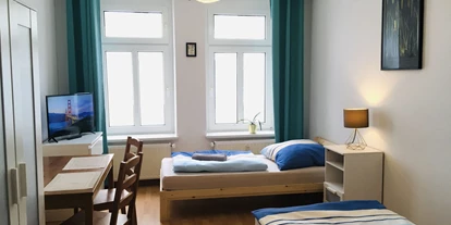 Monteur-Zimmer - Sachsen-Anhalt - https://monteurzimmerleipzig24.de/wp-content/uploads/2025/01/Schlafzimmer-Monteurwohnung-1-min-scaled.jpg - Monteurzimmer Leipzig 24