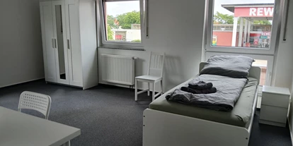 Monteur-Zimmer - Sachsen-Anhalt - Apartments mit Einzelbetten, Bad, voll ausgestattete Küche, WLAN in 06237 Leuna