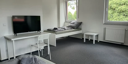 Monteur-Zimmer - Sachsen-Anhalt - Apartments mit Einzelbetten, Bad, voll ausgestattete Küche, WLAN in 06237 Leuna