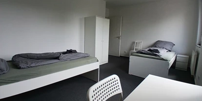 Monteur-Zimmer - Sachsen-Anhalt - https://www.deutschland-monteurzimmer.de/uploads/20070/1752060469686e5235dbdef.jpg - Apartments mit Einzelbetten, Bad, voll ausgestattete Küche, WLAN in 06237 Leuna