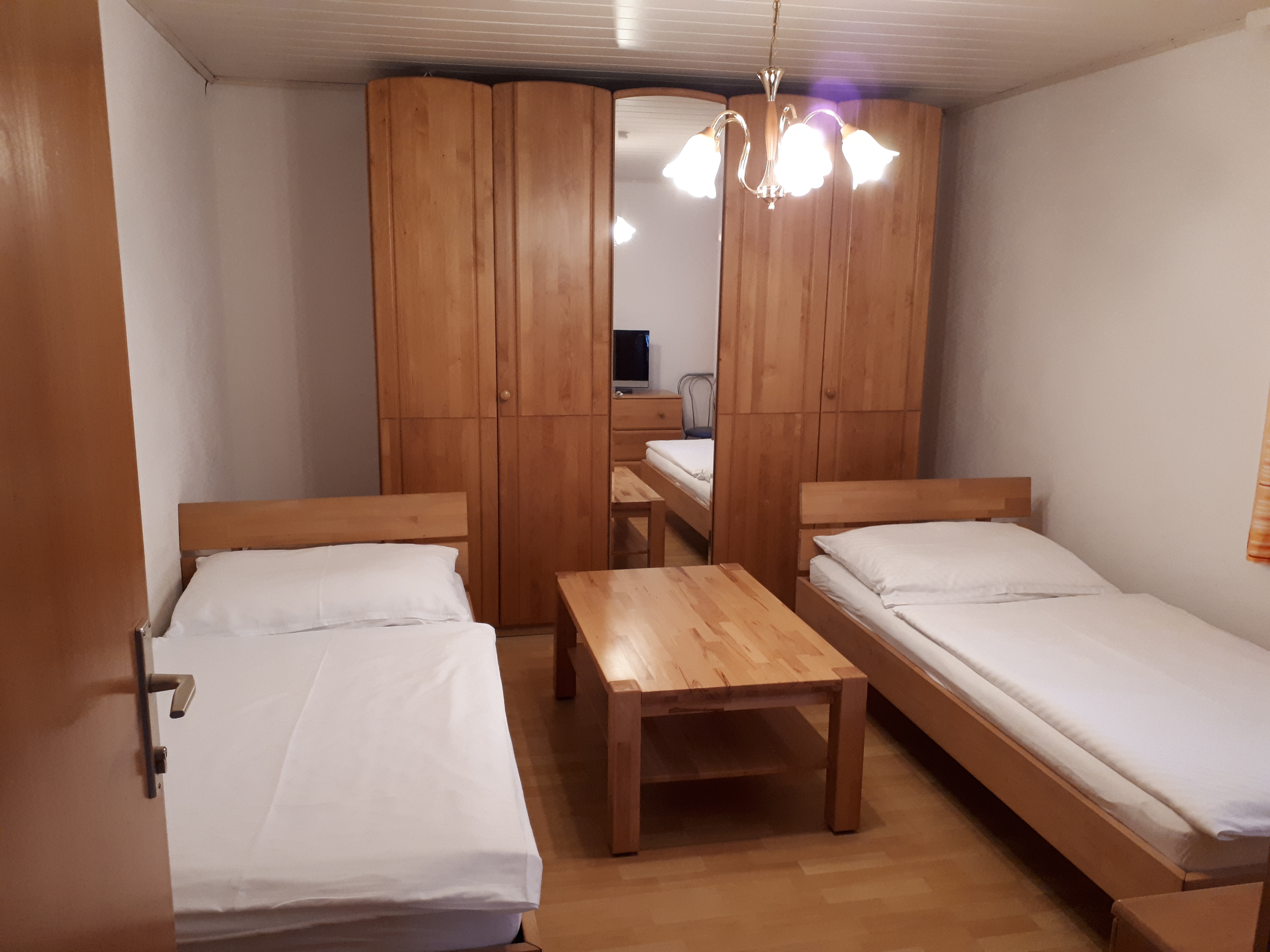 MonteurZimmer: Schlafzimmer  - Haus Neumayer Ferienwohnungen