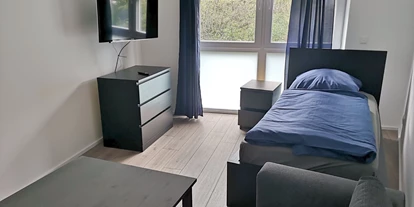 Monteur-Zimmer - Maintal - https://images.monteurzimmer.de/mobct9mnyx/xl/bf3526ef-956f-42b1-bb5c-8210f0693ed9.jpg - Frankfurter Bett - möblierte Unterkünfte