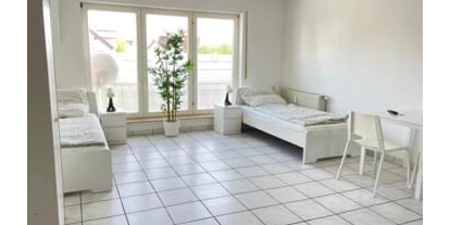 Monteur-Zimmer - Dietzenbach - https://mein-monteurzimmer.de/website/var/tmp/image-thumbnails/280000/284735/thumb__housing_item_preview/51de08a59e5429cd25e088b8fc9a78b3.jpeg - Monteurwohnung Nähe Frankfurt am Main mit Einzelbetten, Küche, Parkplatz, eigenem Bad und mehr