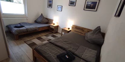 Monteur-Zimmer - Preis pro Nacht - Deutschland - Schlafzimmer 2 mit zwei Betten - Ferienwohnung "Am Rathaus" in 66849 Landstuhl