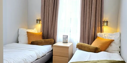 Monteur-Zimmer - Overath - Zweibettzimmer mit Dusche/WC, TV, Wi-Fi - City Hotel Storch in 50672 Köln