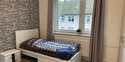 Monteur-Zimmer - Mülheim an der Ruhr - Monteurwohnung Duisburg-4 Einzelbetten-Parkplatz-WLAN