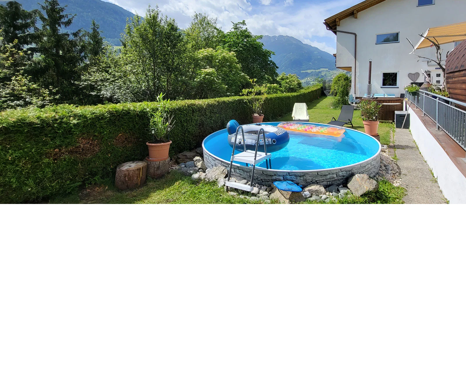 MonteurZimmer: Garten - Haus Alpenhahn