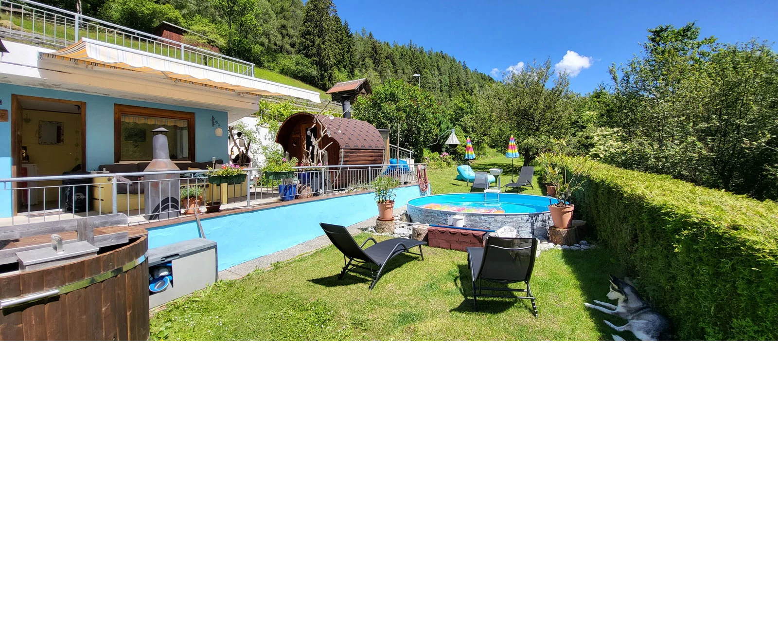 MonteurZimmer: Garten - Haus Alpenhahn