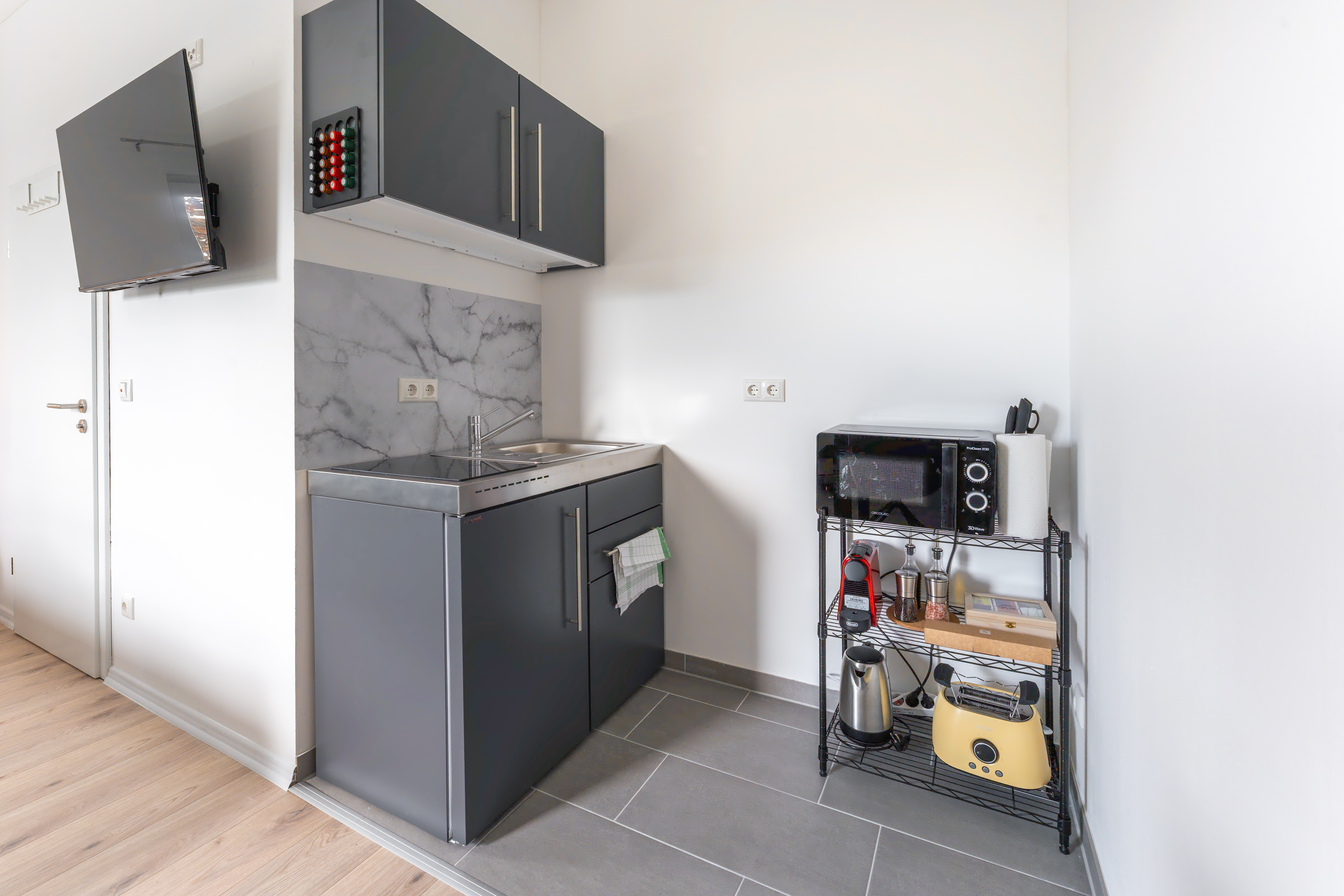 MonteurZimmer: Küche - Komfortable Apartments